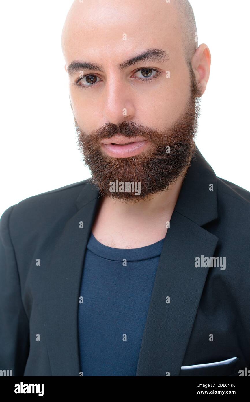 A bearded bold man in a black jacket portrait Stock Photo