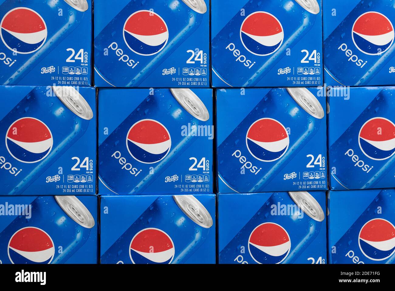 Indianapolis - Circa November 2020: Pepsi cases on display. Pepsi and PepsiCo are among the largest beverage producers in the world. Stock Photo