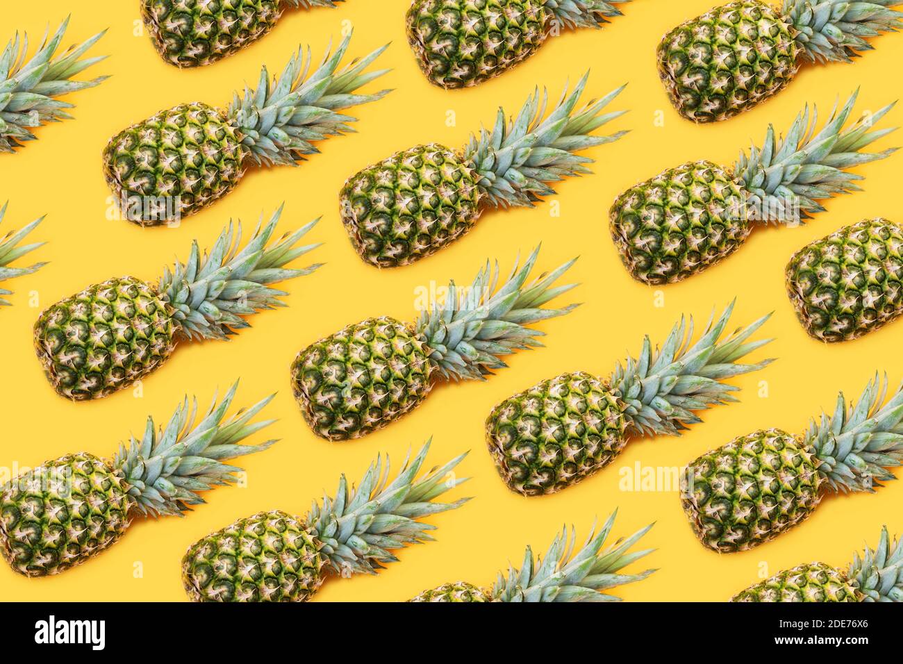 Pineapple pattern on yellow background Stock Photo