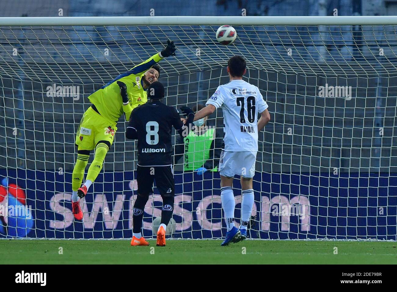 Lugano, Switzerland. 29th Nov, 2020. Cristopher Lungoyi (#8 FC Lugano) and  Albian Hajdari (#76 FC Basel 1893) in action during the Swiss Super League  match between FC Lugano and FC Basel 1893