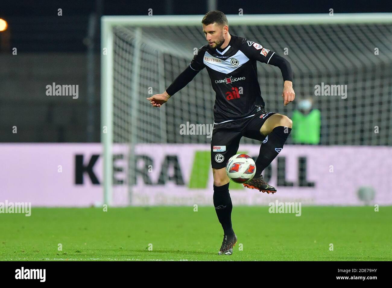 Lugano, Switzerland. 29th Nov, 2020. Cristopher Lungoyi (#8 FC Lugano) and  Albian Hajdari (#76 FC Basel 1893) in action during the Swiss Super League  match between FC Lugano and FC Basel 1893