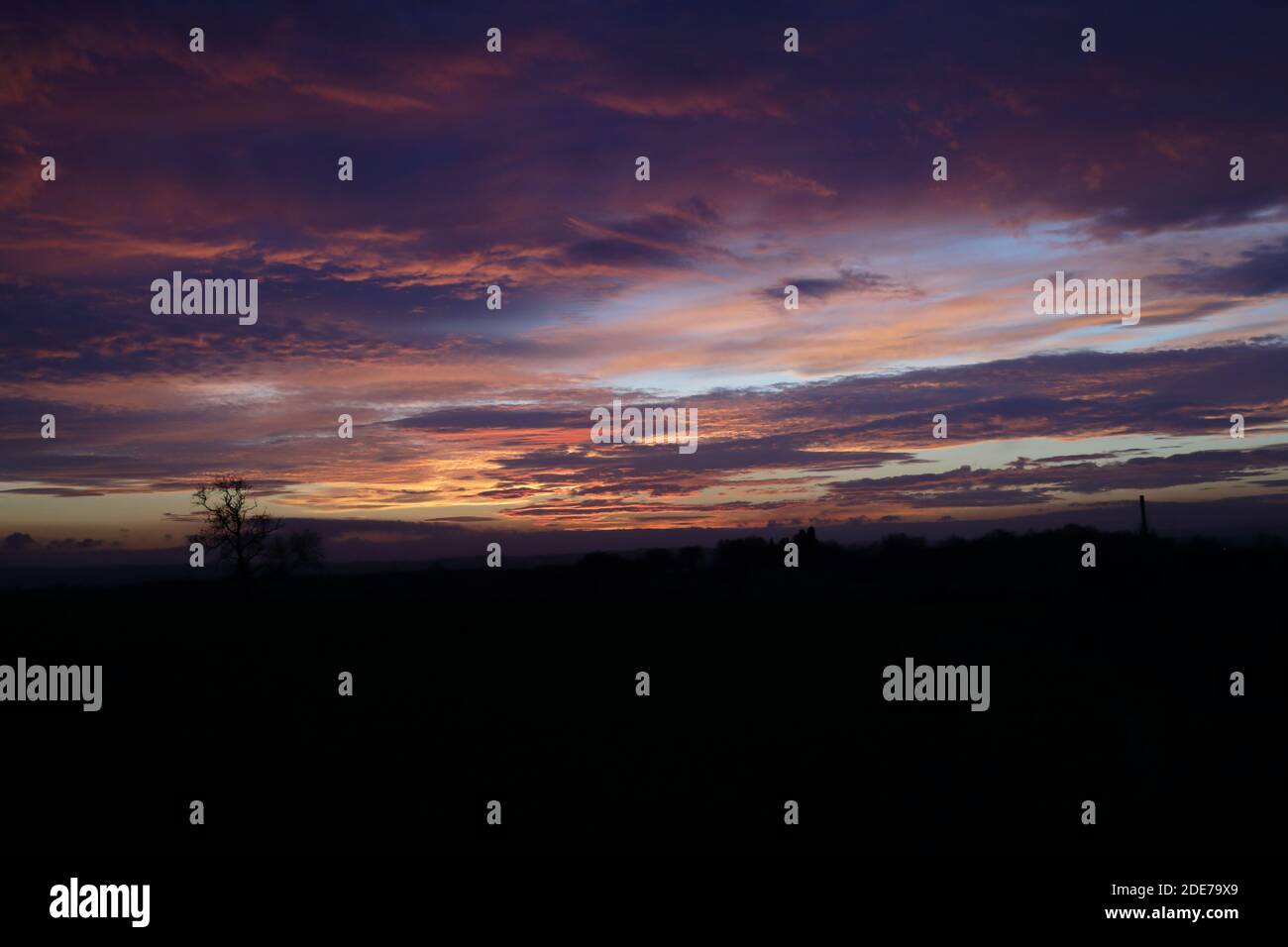 November sunset looking out across fields Stock Photo Alamy