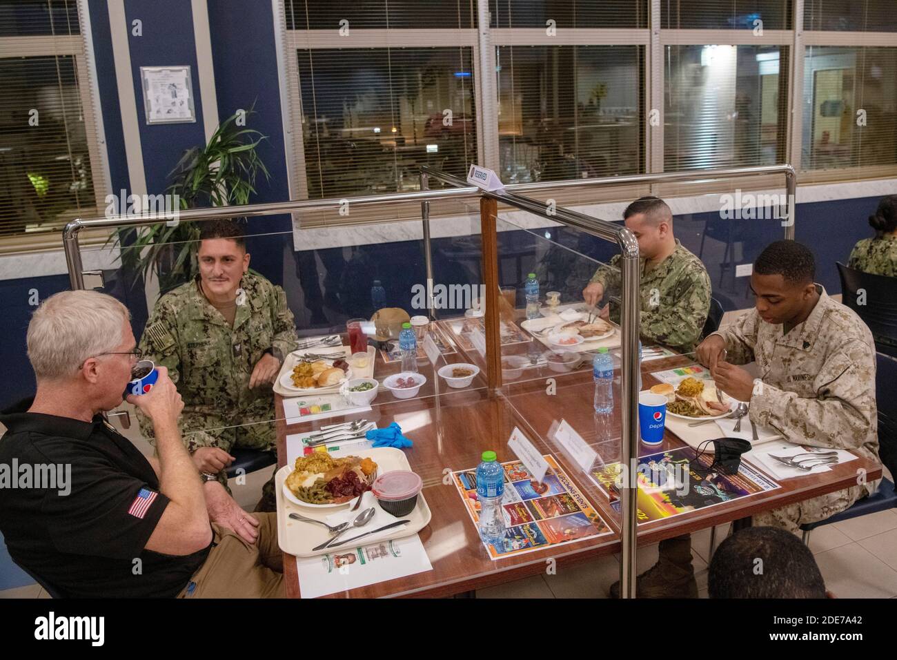U.S. Acting Secretary of Defense Christopher Miller, left, joins service members for Thanksgiving dinner at Naval Support Activity Bahrain November 25, 2020 in Manama, Bahrain. Stock Photo