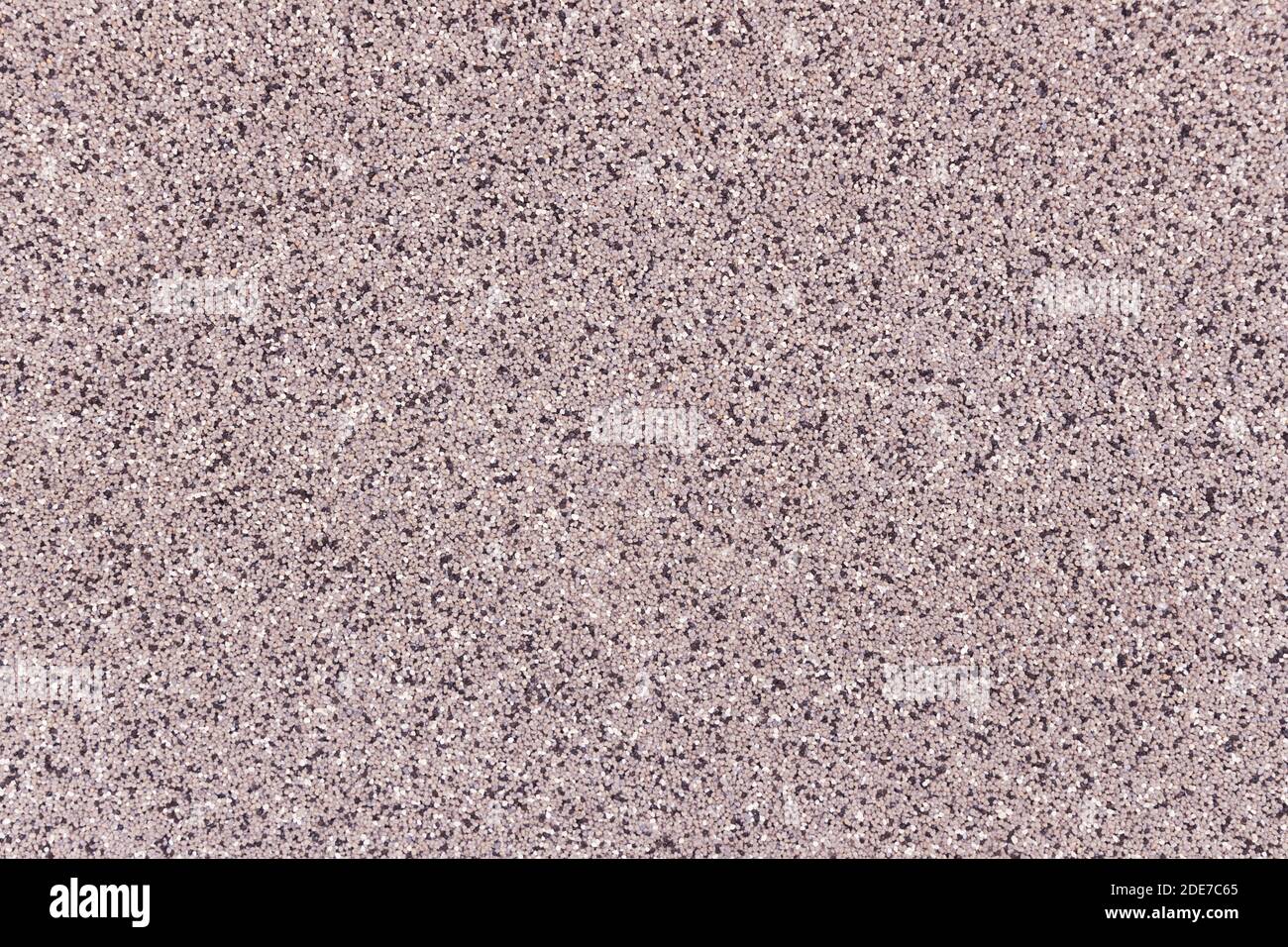 Fine pebbles wall background Stock Photo