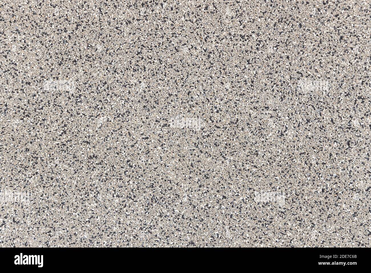 Fine pebbles wall background Stock Photo