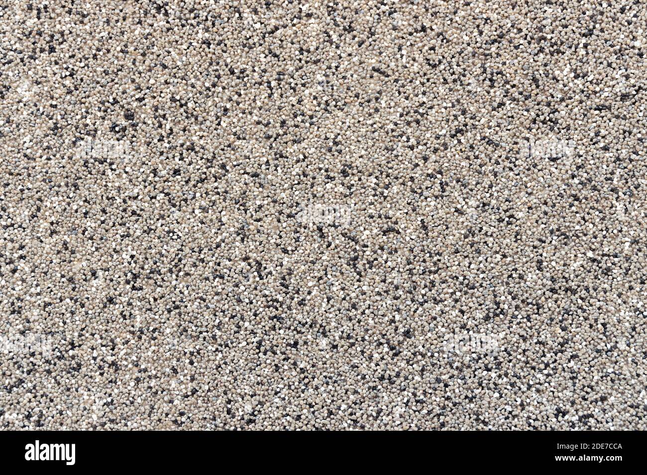 Fine pebbles wall background Stock Photo