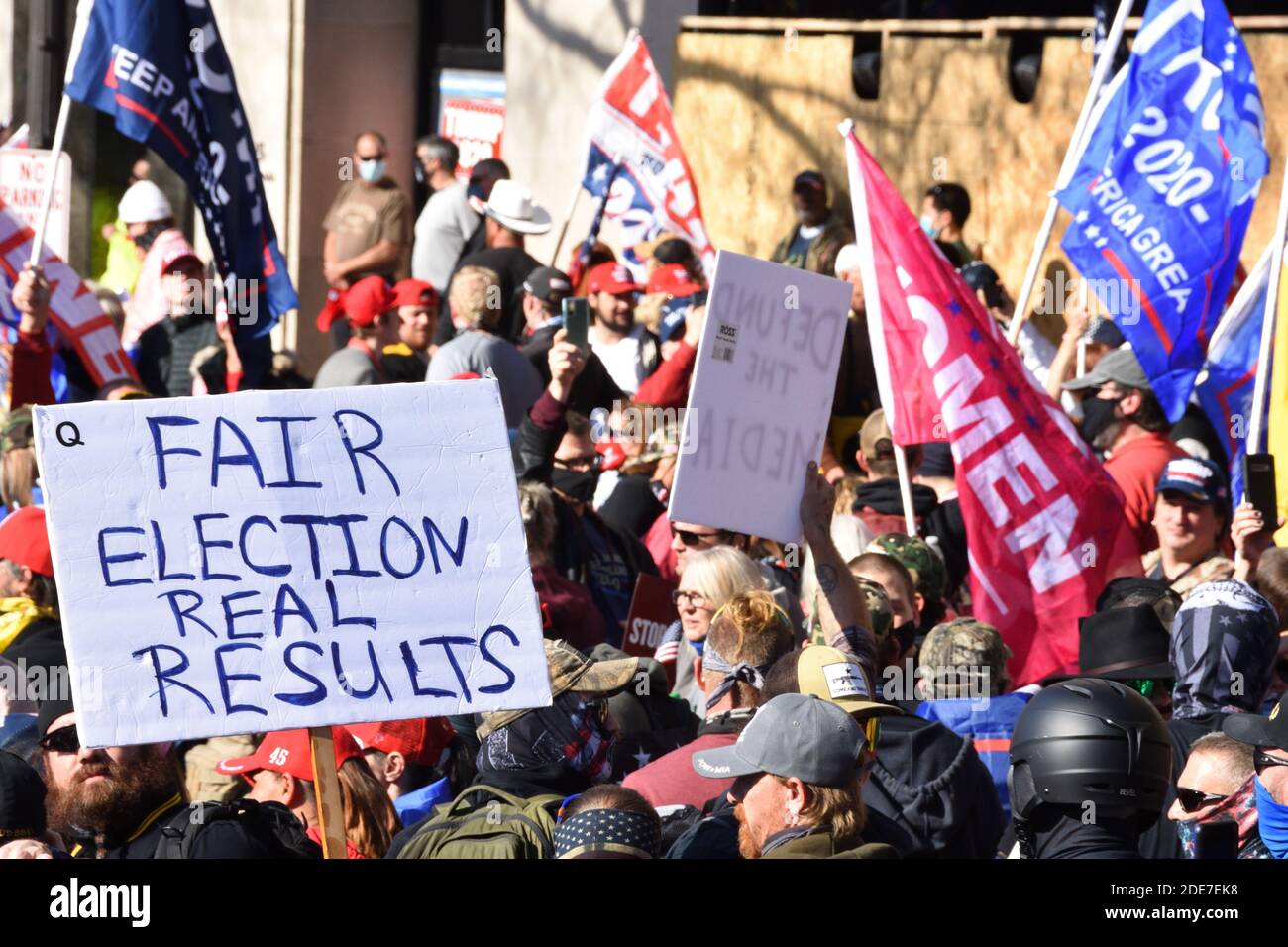 Washington DC. November 14, 2020. Million Maga March. People with political signs, Trump flags and Women for Trump flag at Freedom Plaza. Stock Photo