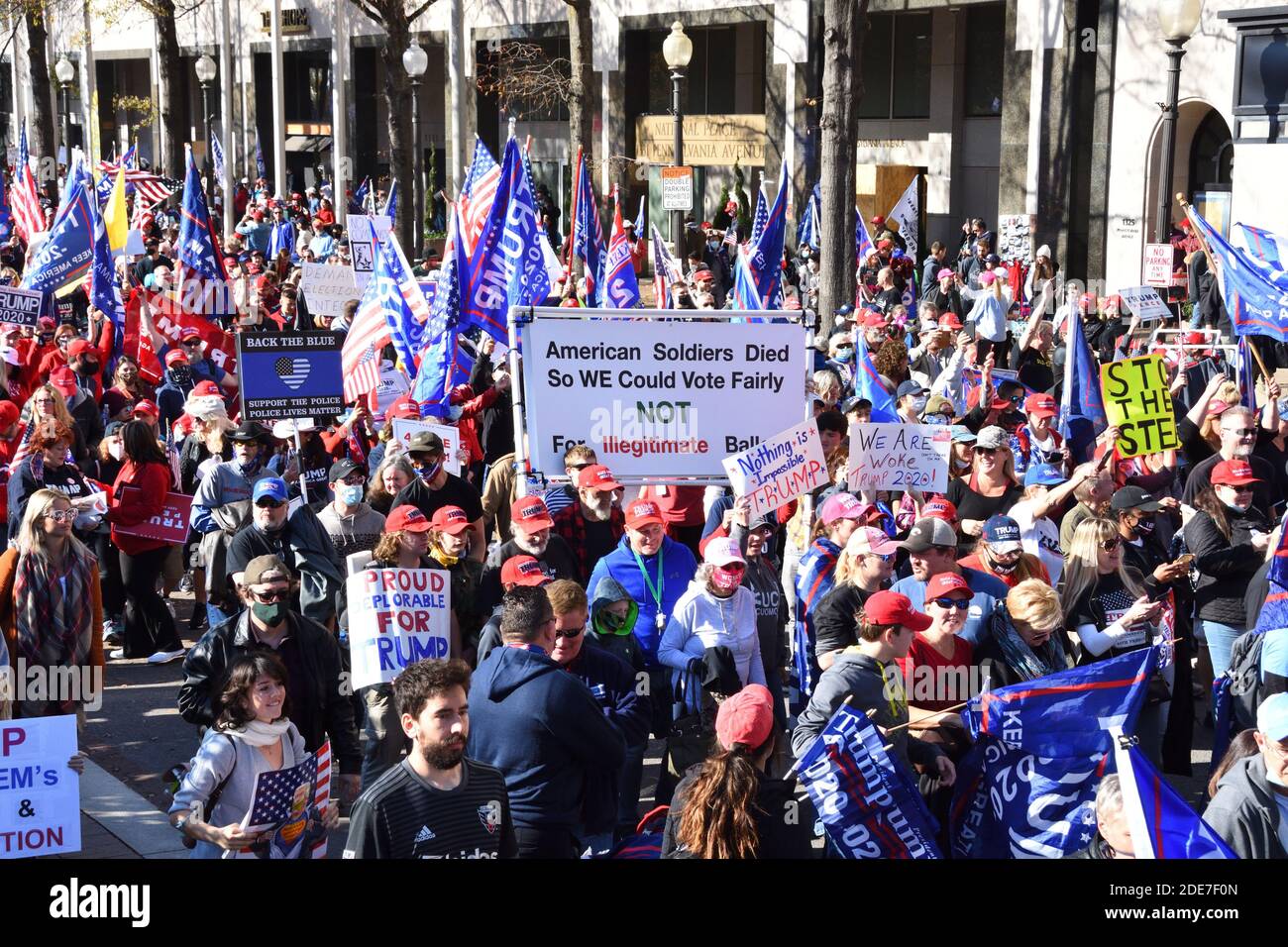 Washington DC. Nov 14, 2020. Million Maga March. Large group of peaceful Trump’s supporters with placards, signs and flags gathered at Freedom Plaza. Stock Photo
