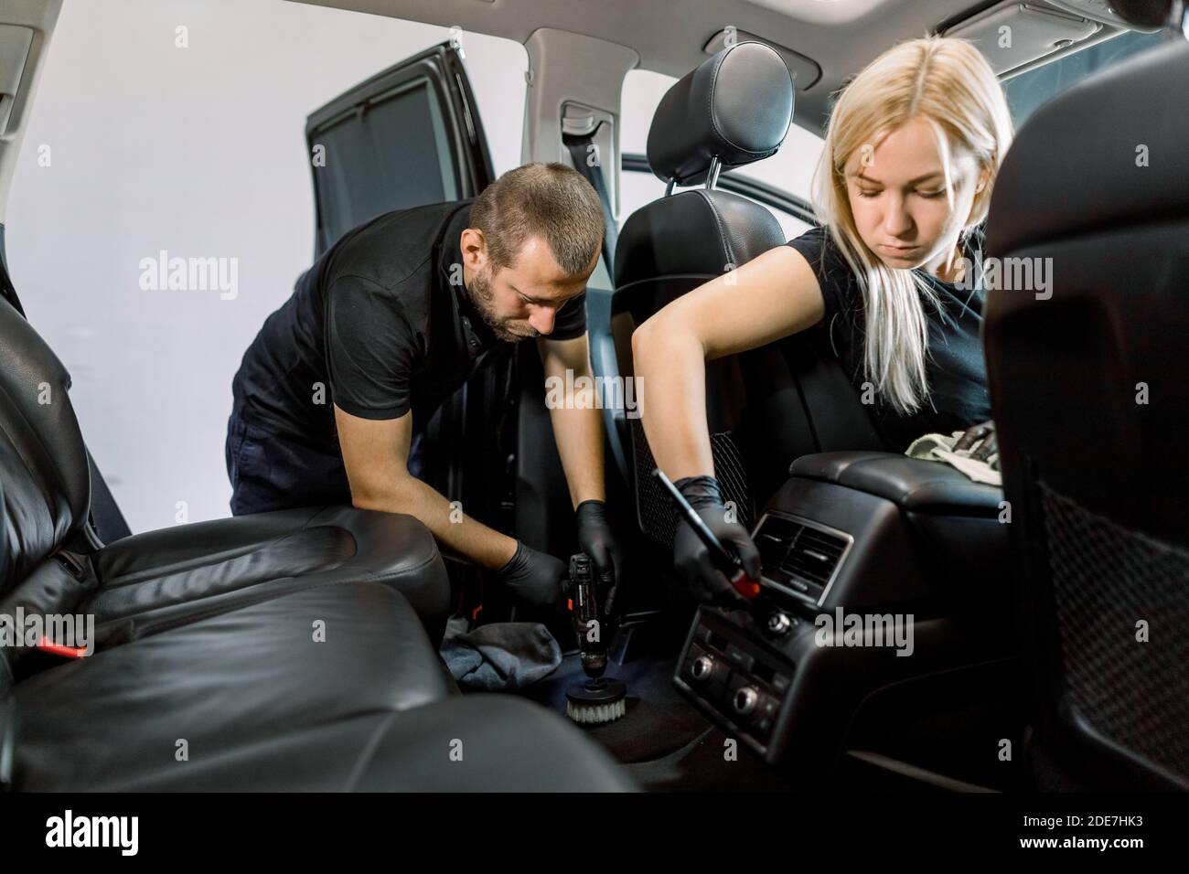 Female Washer Polish Spray Cleans Automobile Interior Car Wash Service  Stock Photo by ©Nomadsoul1 326077742