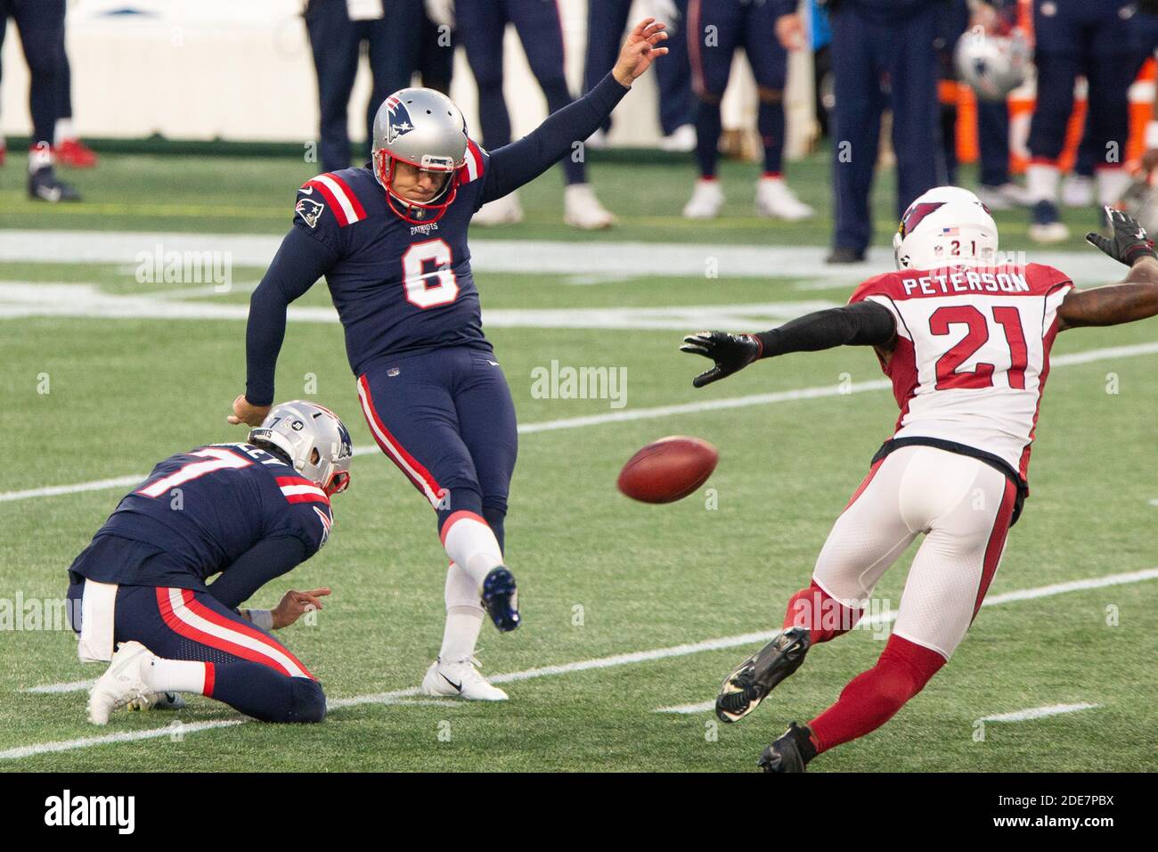 Foxborough, United States. 29th Nov, 2020. New England Patriots kicker Nick Folk (6) connects for a 50-yard game winning field goal held by Jake Bailey (7) while under pressure by Arizona Cardinals cornerback Patrick Peterson (21) in the fourth quarter at Gillette Stadium in Foxborough, Massachusetts on Sunday, November 29, 2020. The Patriots defeated the Cardinals 20-17. Photo by Matthew Healey/UPI Credit: UPI/Alamy Live News Stock Photo