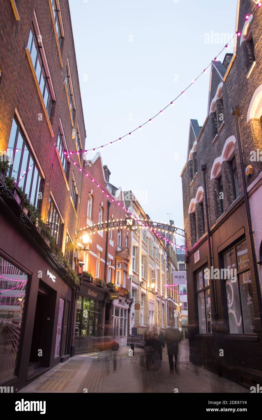 Carnaby Street Christmas Lights 2020 Bright Neon Pink Night Life Newburgh Quarter Foubert's place, Soho, West End, Westminster, London W1F Stock Photo