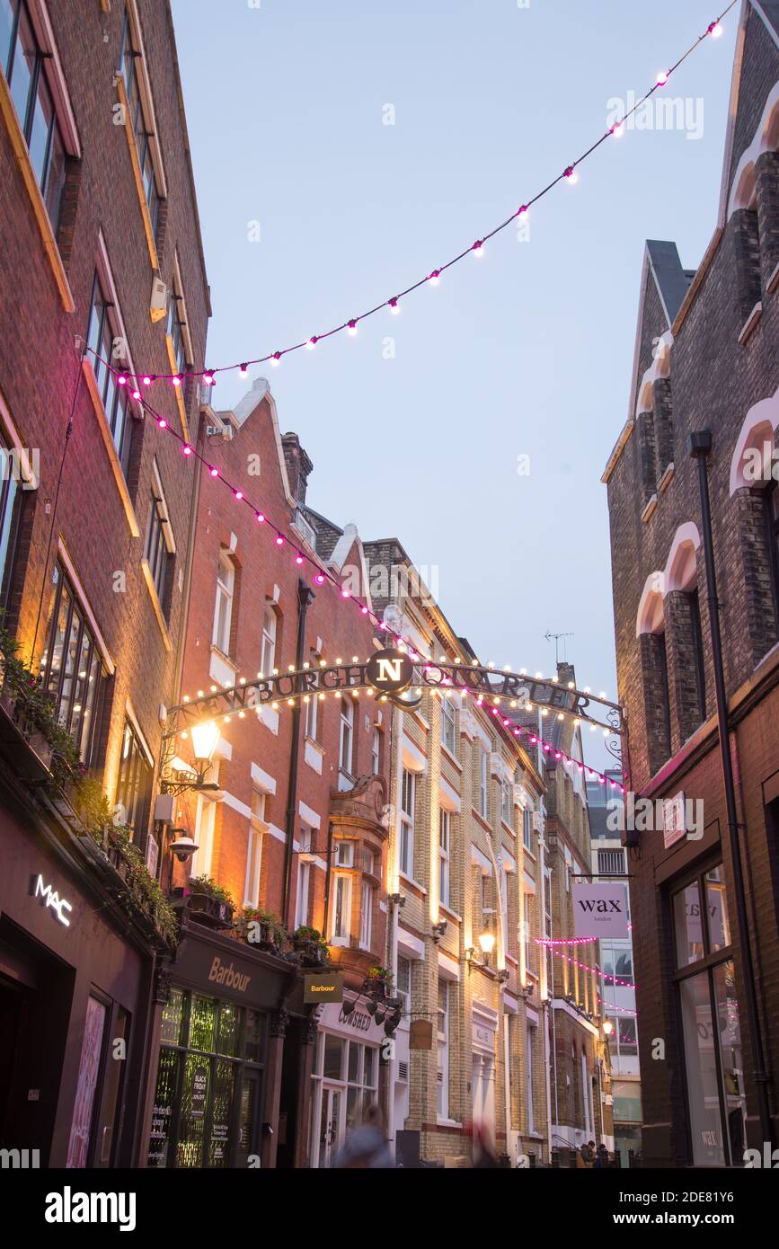 Carnaby Street Christmas Lights 2020 Bright Neon Pink Night Life Newburgh Quarter Foubert's place, Soho, West End, Westminster, London W1F Stock Photo