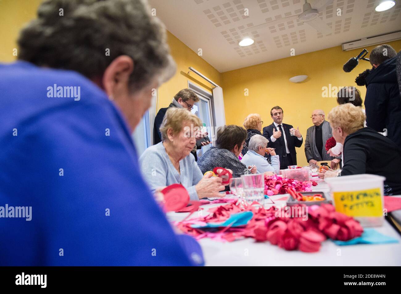 French President Emmanuel Macron meets elderly people in a retirement home  (EPHAD) at the day center Le Clos de l'Hermitage in Bourg-de-Peage near  Valence, southern France, January 24, 2019. Macron visits the