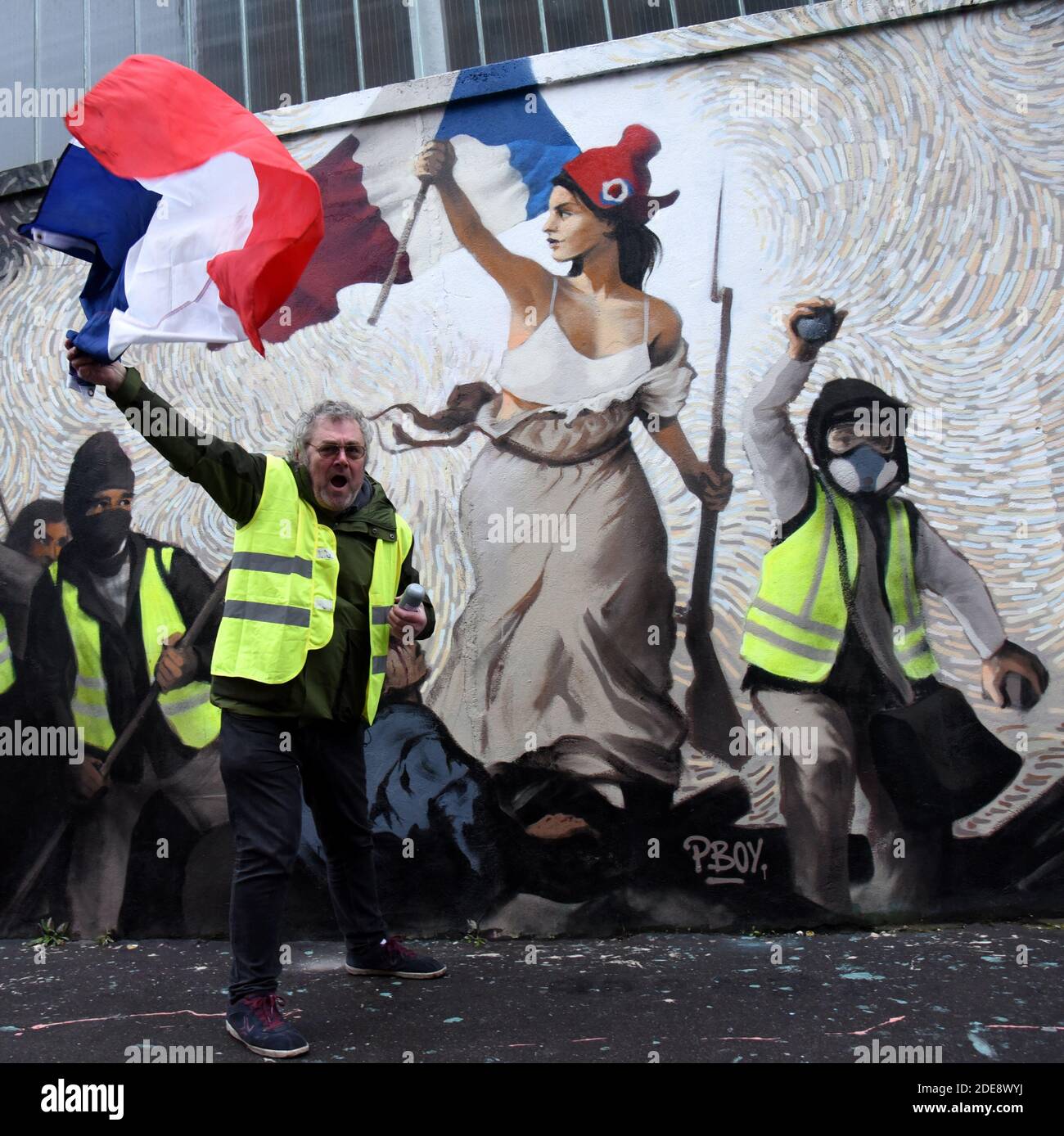 A fresco paint by French street artist PBOY (Pascal Boyart) on the Yellow  Vests "Gilets Jaunes" movement inspired by the painting of Eugene Delacroix  'Liberty Leading the People' (Liberte Guidant Le Peuple)
