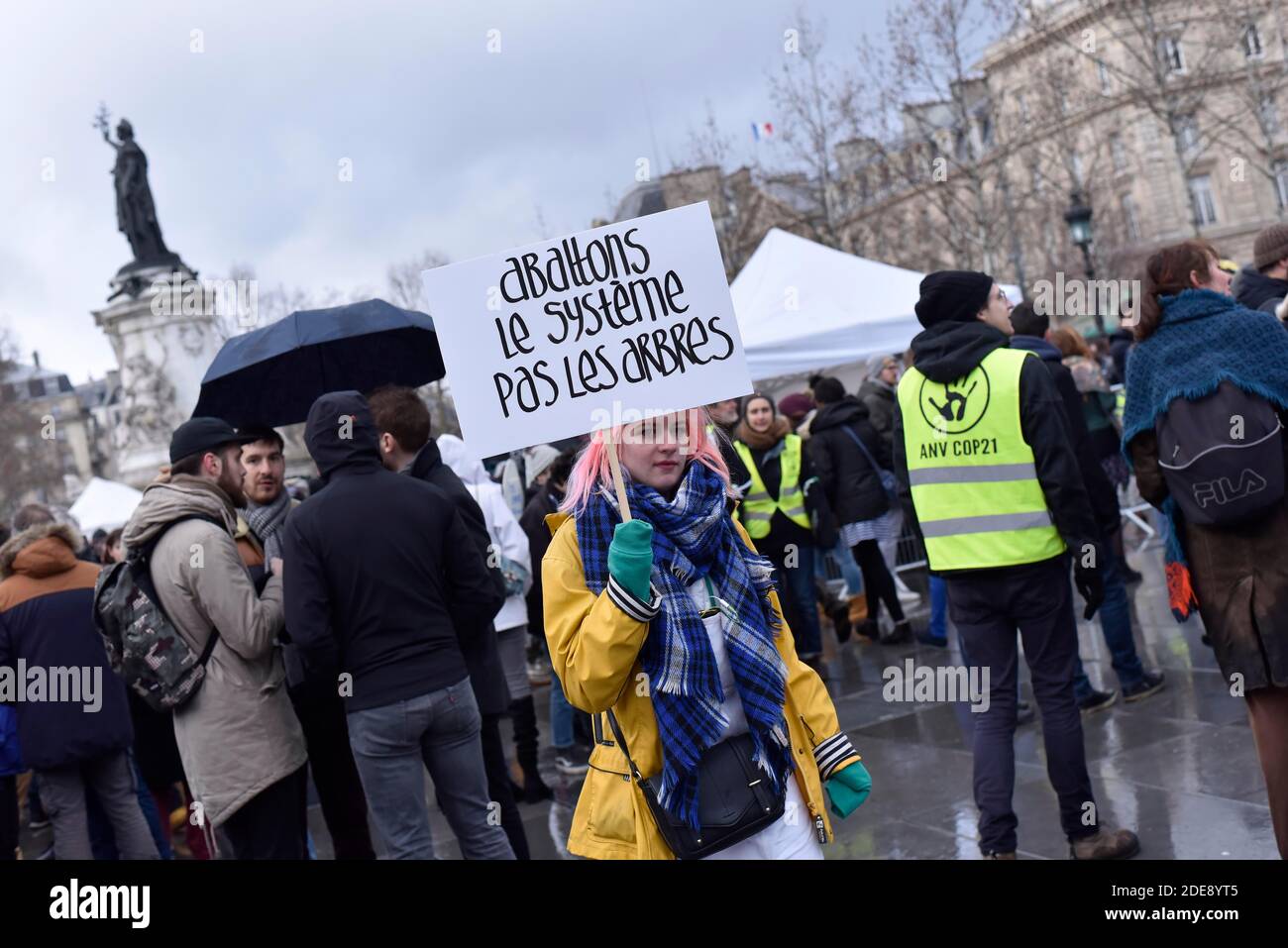 People take part in a 'Climate' rally calling on authorities to take ...