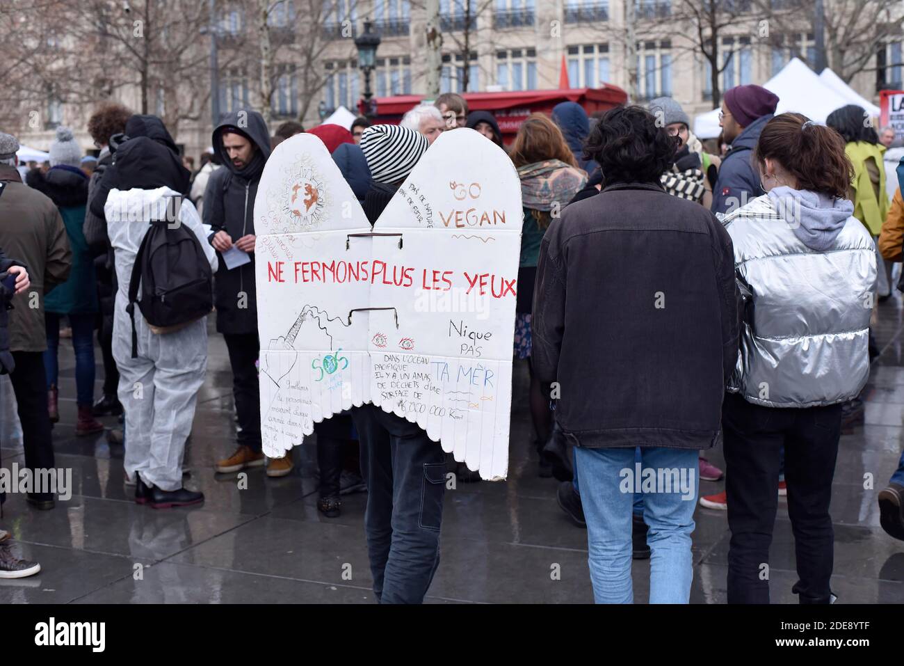 People take part in a 'Climate' rally calling on authorities to take ...