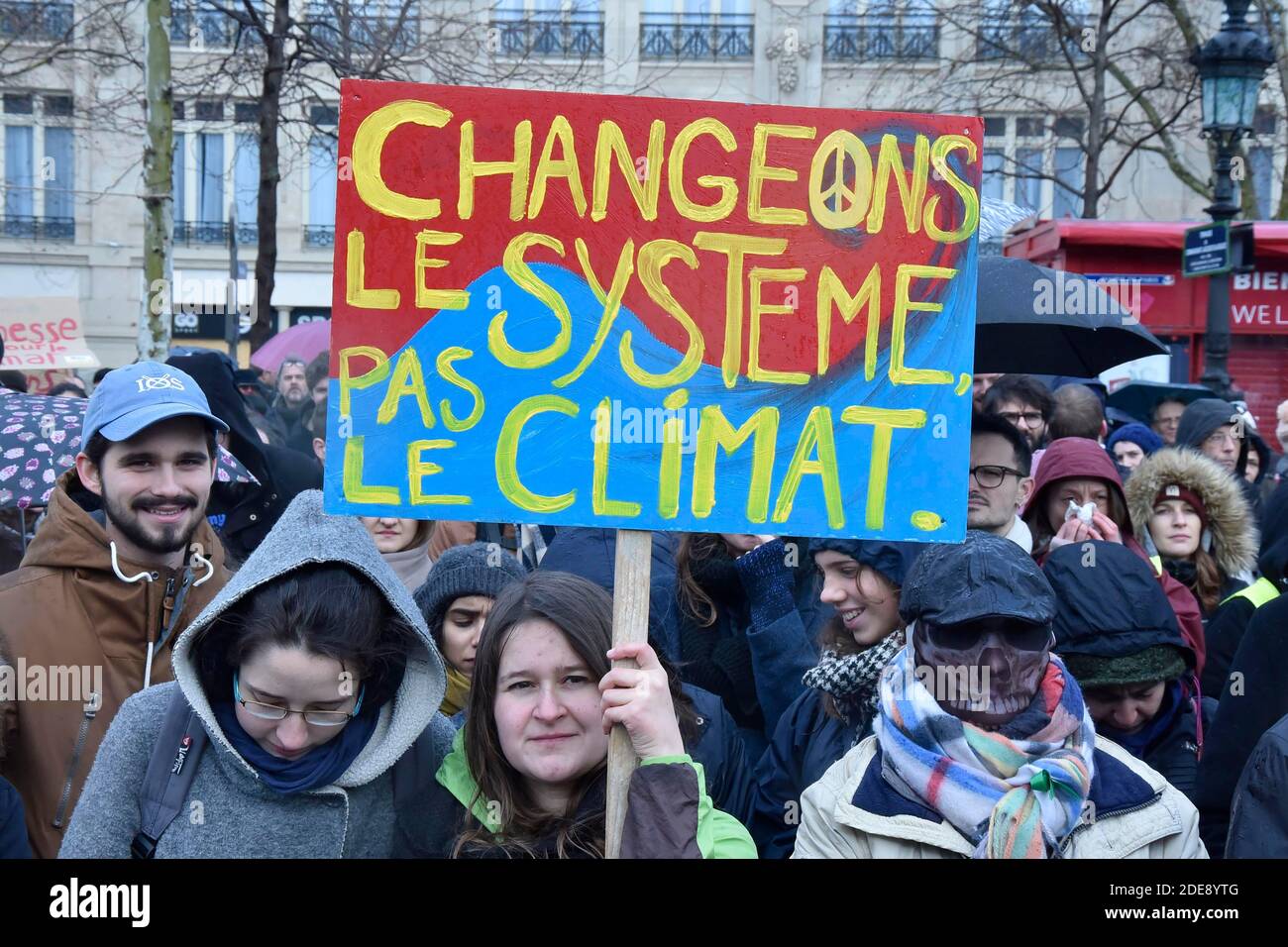 People take part in a 'Climate' rally calling on authorities to take ...