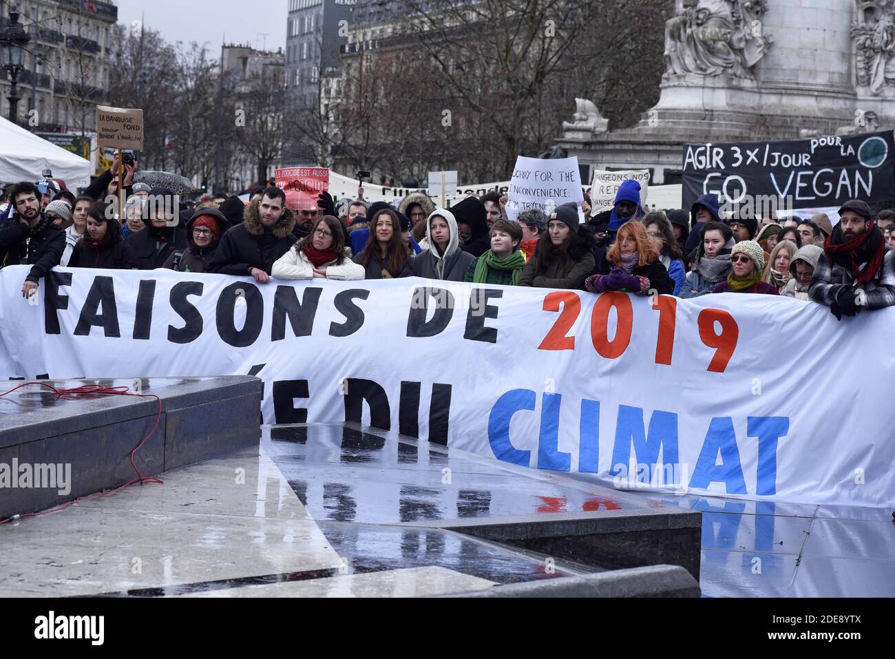 People take part in a 'Climate' rally calling on authorities to take ...