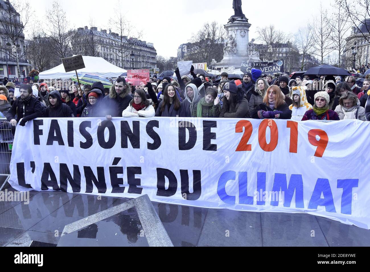 People take part in a 'Climate' rally calling on authorities to take ...