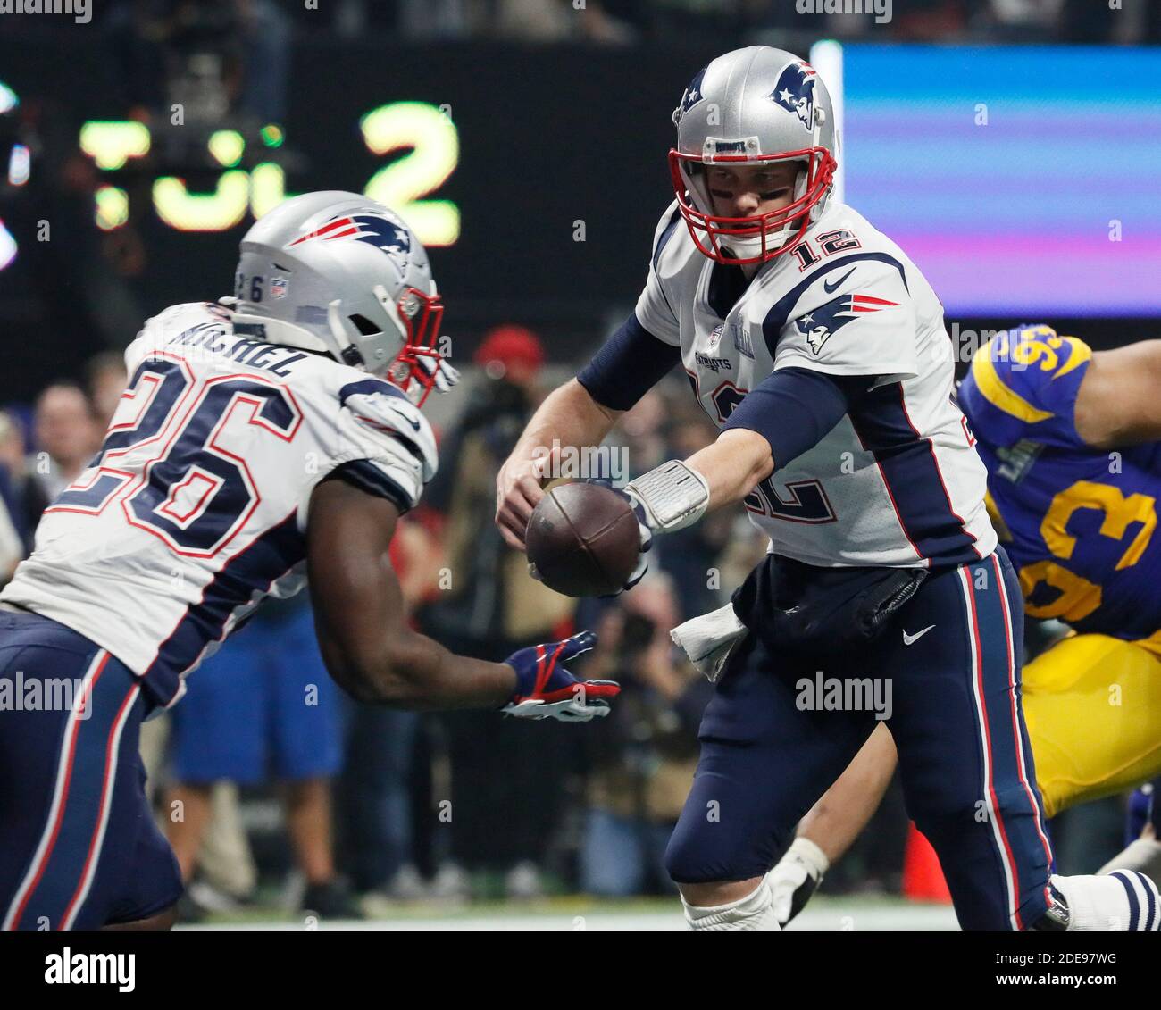 NO FILM, NO VIDEO, NO TV, NO DOCUMENTARY - New England Patriots quarterback Tom Brady (12) hands off to running back Sony Michel (26) on their final scoring drive, which ended in a field goal, against the Los Angeles Rams during Super Bowl LIII at Mercedes-Benz Stadium in Atlanta on Sunday, February 3, 2019. The Patriots won, 13-3. Photo by Bob Andres/Atlanta Journal-Constitution/TNS/ABACAPRESS.COM Stock Photo