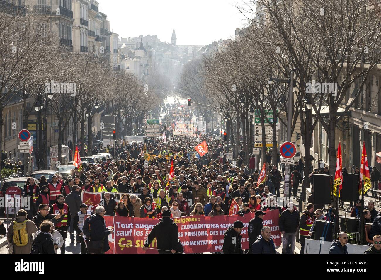 Yellow vest protestors (gilets jaunes) and union members march during a ...