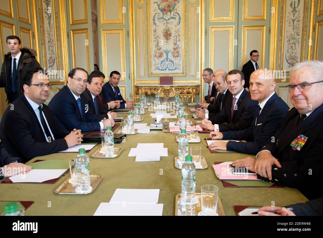 Tunisian prime minister Youssef Chahed (3L) and his delegation meets with  French president Emmanuel Macron (3R), Foreign Affairs minister Jean-Yves  Le Drian (4R), diplomatic advisor Philippe Etienne (5R), French ambassador  in Tunisia