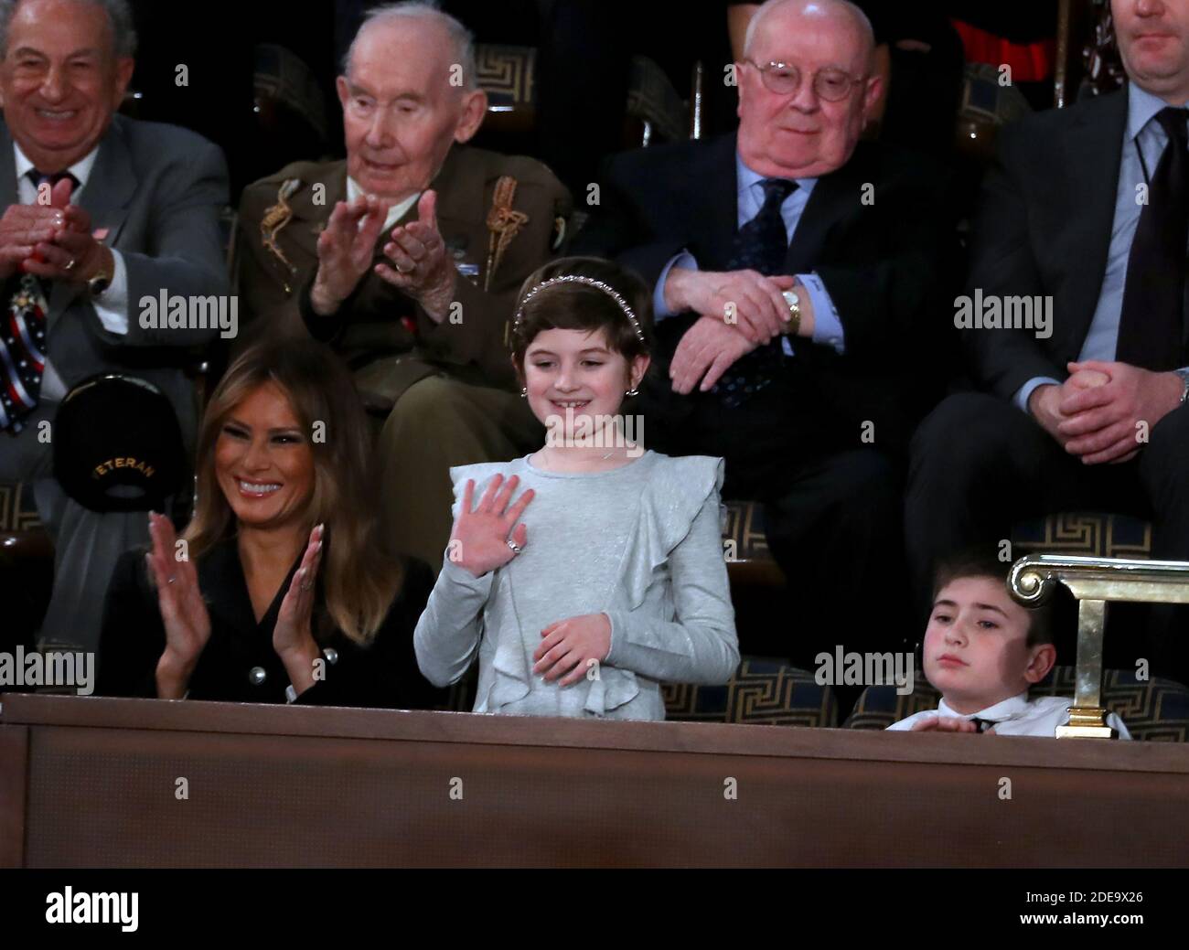 Grace Eline, who was diagnosed with Germinoma, a germ-cell brain tumor, waves to the audience after being introduced by United States President Donald J. Trump during his second annual State of the Union Address to a joint session of the US Congress in the US Capitol in Washington, DC on Tuesday, February 5, 2019. Grace recently finished chemotherapy and currently shows no evidence of the disease. First lady Melania Trump applauds at left. Joshua Trump, a sixth grader who was bullied at school because of his last name is pictured at right. Photo by Alex Edelman / CNP/ABACAPRESS.COM Stock Photo