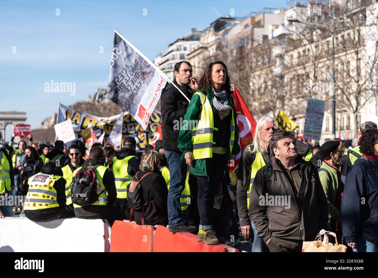 To celebrate the 3 months of the Yellow Vests (Gilets Jaunes) movement, a  few hundred people gathered on the Champs-Elysées to participate in a  peaceful march towards the Champ de Mars. So