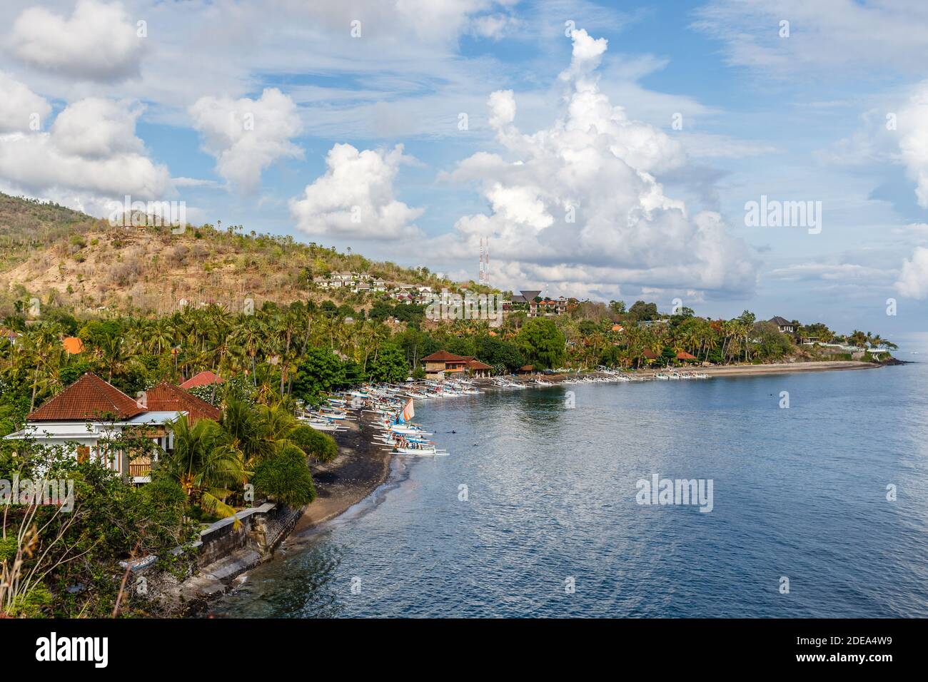 Views of Amed ocean, bay, houses, traditional fishing boats jukung