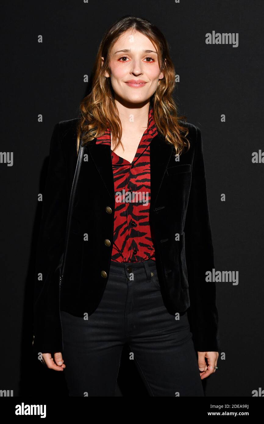 Lola Bessis attends the Saint Laurent show as part of the Paris Fashion