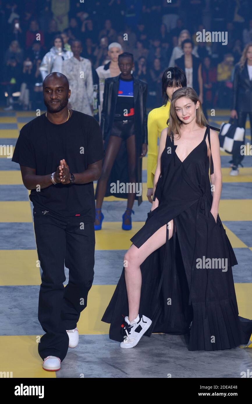 Designer Virgil Abloh and Gigi Hadid walk the runway during the