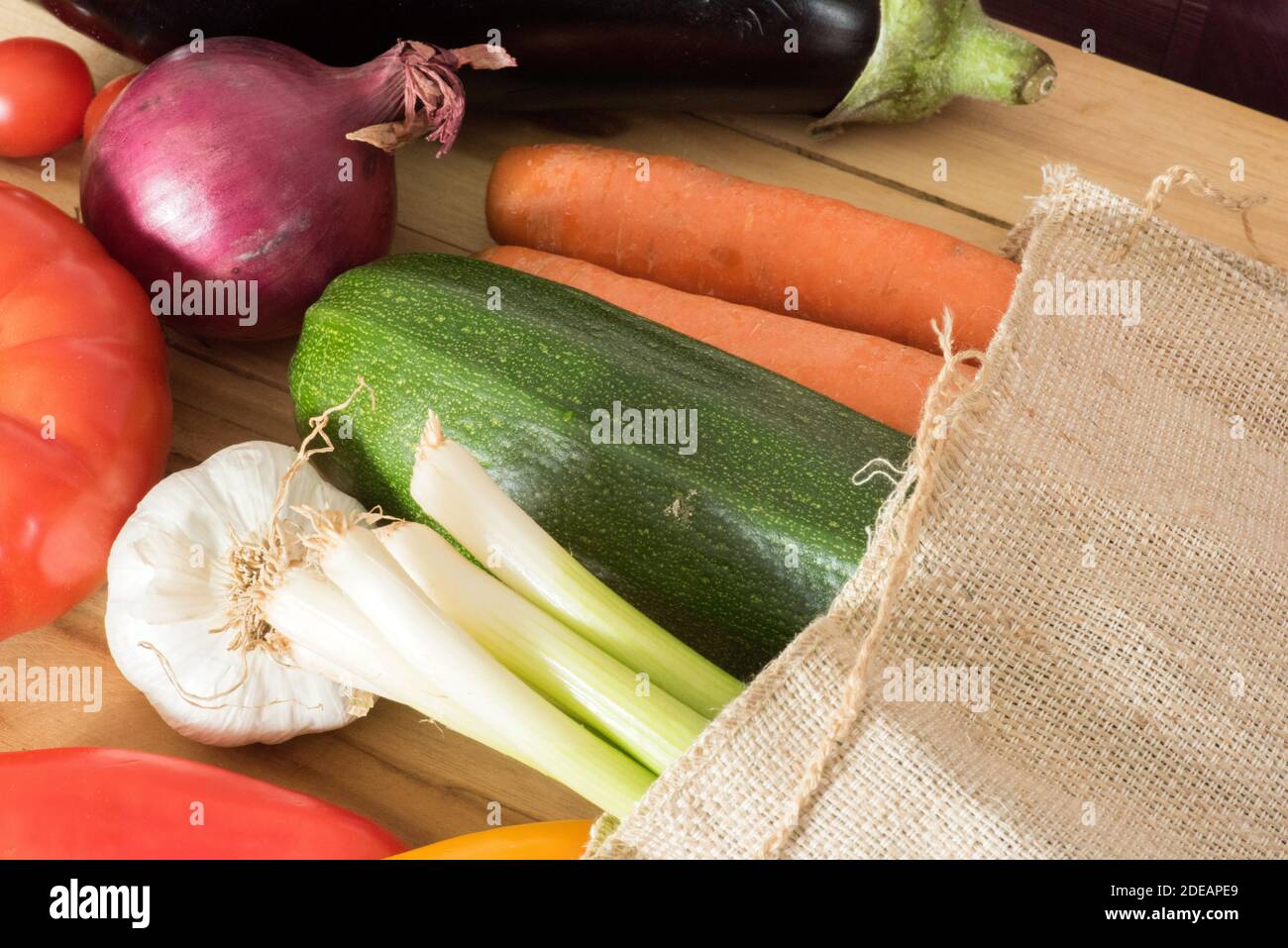 Lots of vegetables in a jute bag Stock Photo Alamy