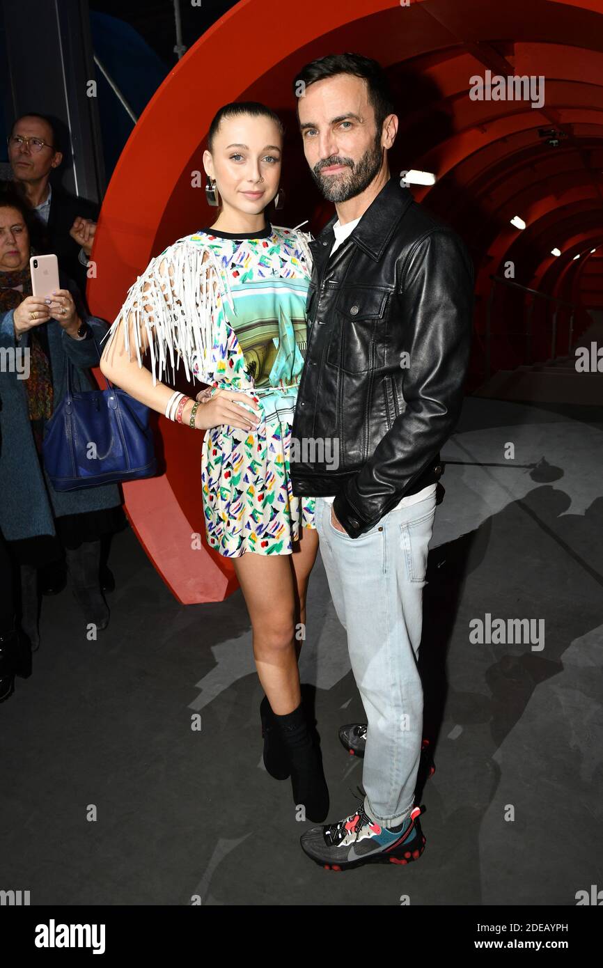 Emma Chamberlain and Stylist Nicolas Ghesquiere pose after the Louis  Vuitton show as part of the Paris Fashion Week Womenswear Fall/Winter 2019/ 2020 on March 05, 2019 in Paris, France. Photo by Laurent