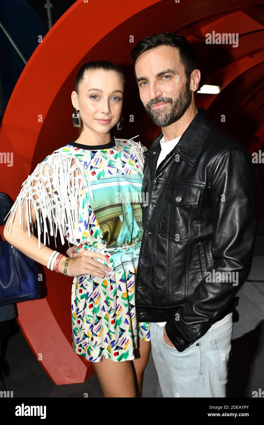 Emma Chamberlain and Stylist Nicolas Ghesquiere pose after the