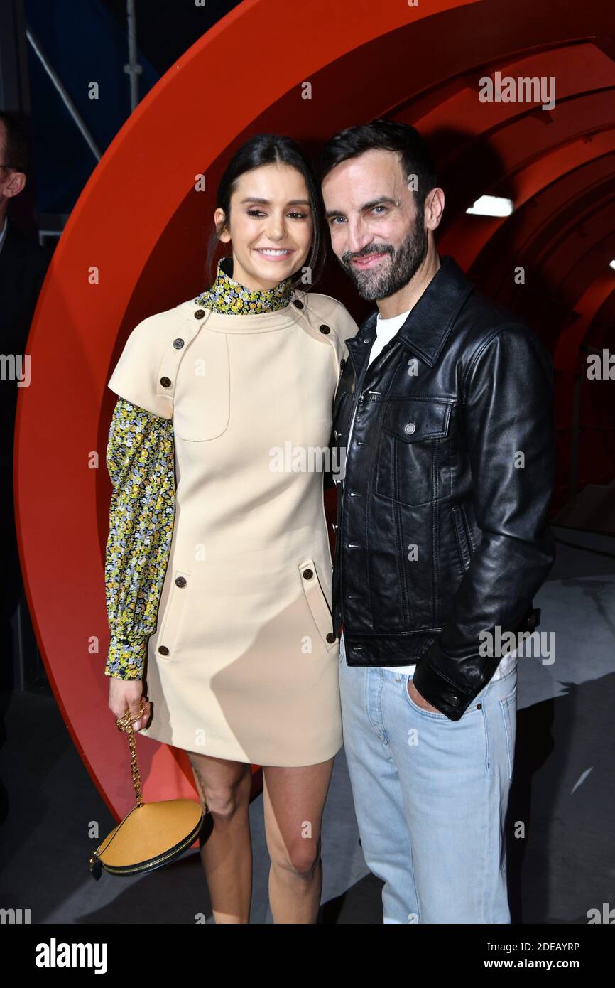 Emma Chamberlain and Stylist Nicolas Ghesquiere pose after the Louis  Vuitton show as part of the Paris Fashion Week Womenswear Fall/Winter 2019/ 2020 on March 05, 2019 in Paris, France. Photo by Laurent