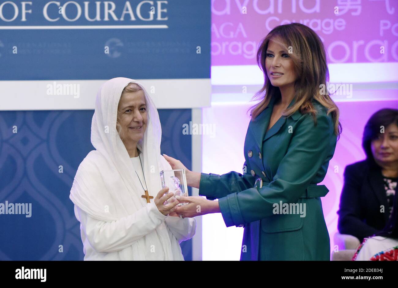 Mama Maggie of Egypt (C) is given the International Women