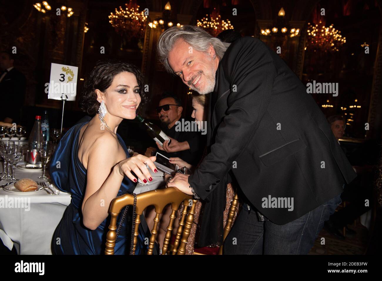Turkish actress Belcim Bilgin Erdogan and Photographer Ralph Wenig attend the 7000 magazine gala dinner at the Intercontinental hotel on March 7, 2019 in Paris, France. Photo by David Niviere/ABACAPRESS.COM Stock Photo