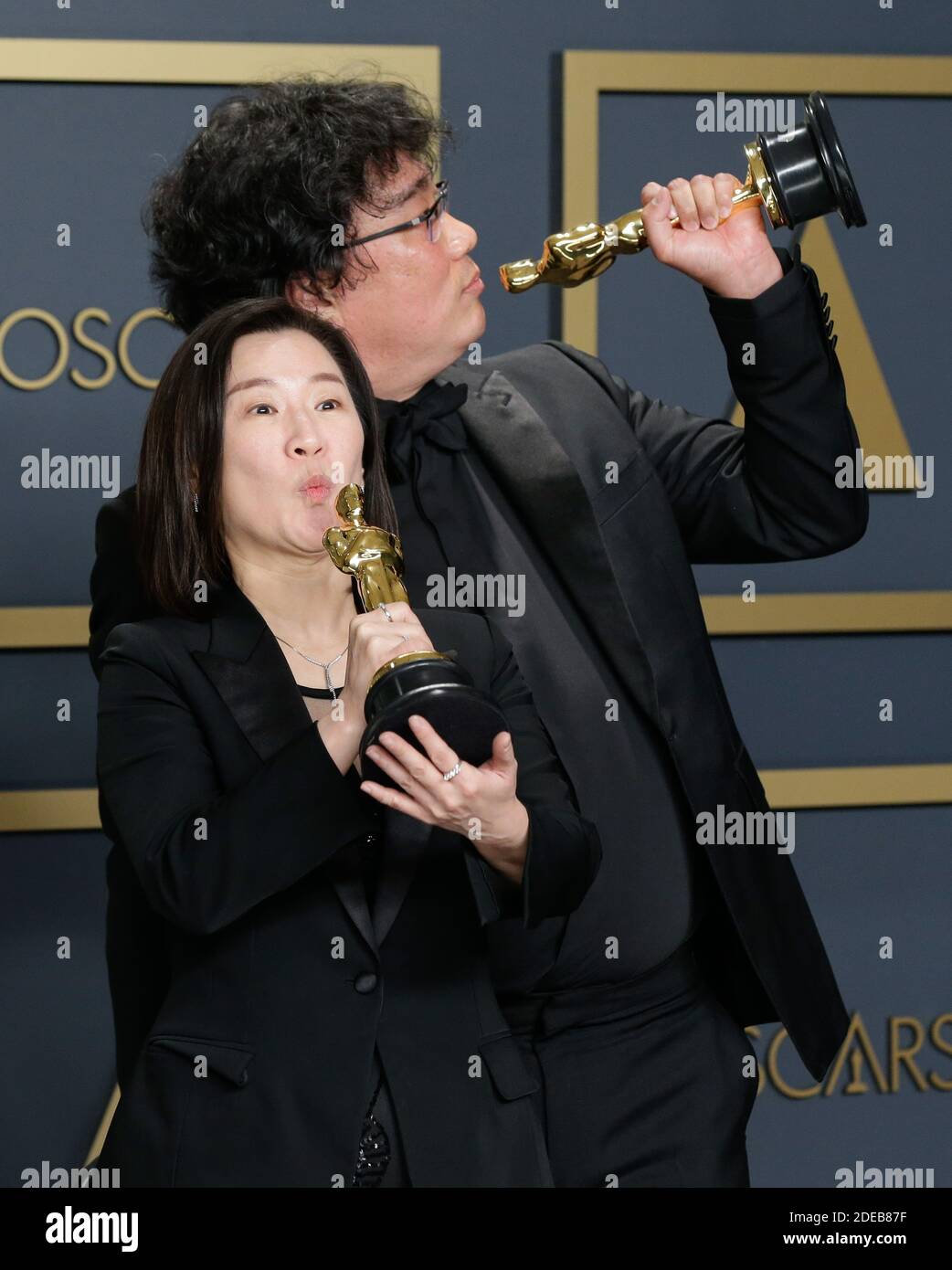 Parasite director Bong Joon Ho and cast members walking on the red carpet  at the 92nd Annual Academy Awards held at the Dolby Theatre in Hollywood,  California on Feb. 9, 2020. (Photo