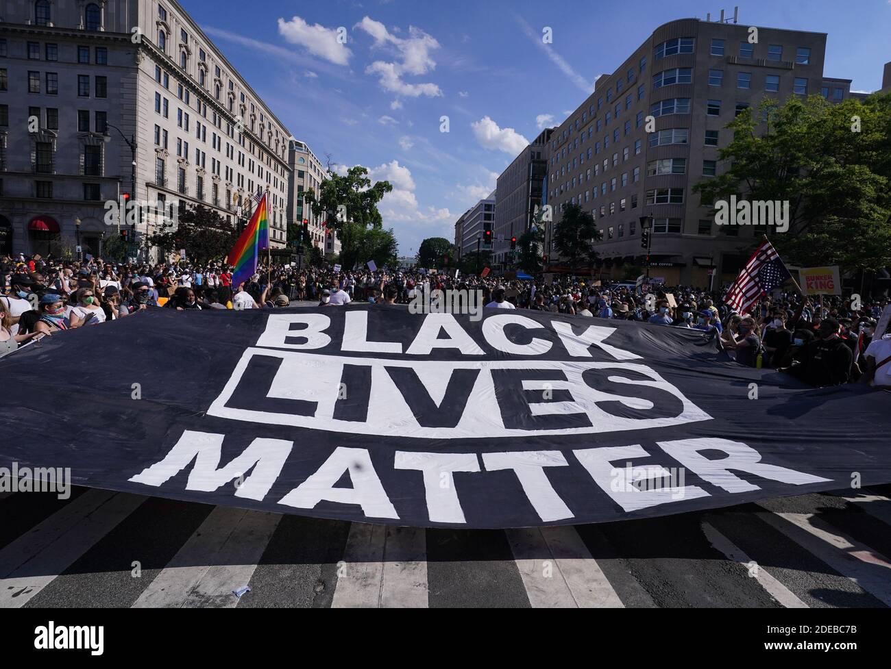 Protesters hold a Black Lives Matter flag when they participate in a protest against racism and police violence in Washington, DC, on Saturday, June 6, 2020. Thousands of protesters in DC and across the nation took to the streets demanding justice for the death of George Floyd, who died in Minneapolis last week after a police officer knelt on his neck for more than eight minutes. Photo by Kevin Dietsch/UPI Stock Photo