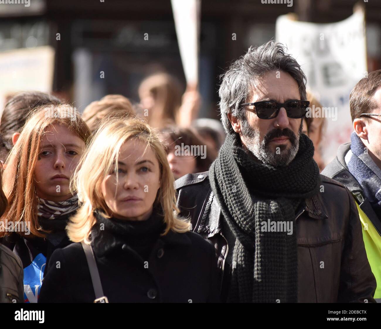 Emmanuelle Beart and her husband Frederic Chaudier take part in the 'March  of The Century' to demand answers to climate change at the Place de l'  Opera in Paris, France, on March