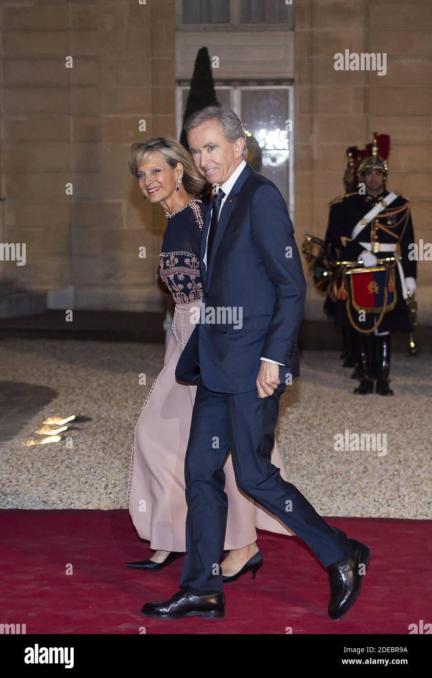 Bernard Arnault and Hélène Arnault arrives in the “Booksellers Area” of the  White House to attend a state dinner honoring France's President Emmanuel  Macron on April 24, 2018 in Washington, DC. Photo