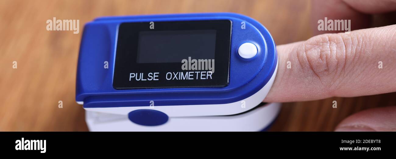 Heart rate monitor is fixed on the finger Stock Photo Alamy