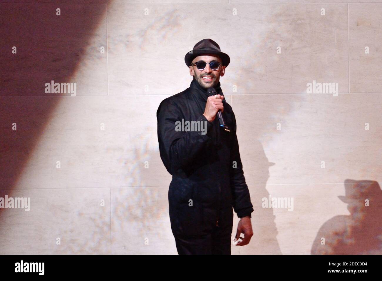 JR attending the 'JR au Louvre & Le Secret de la Grande Pyramide ...