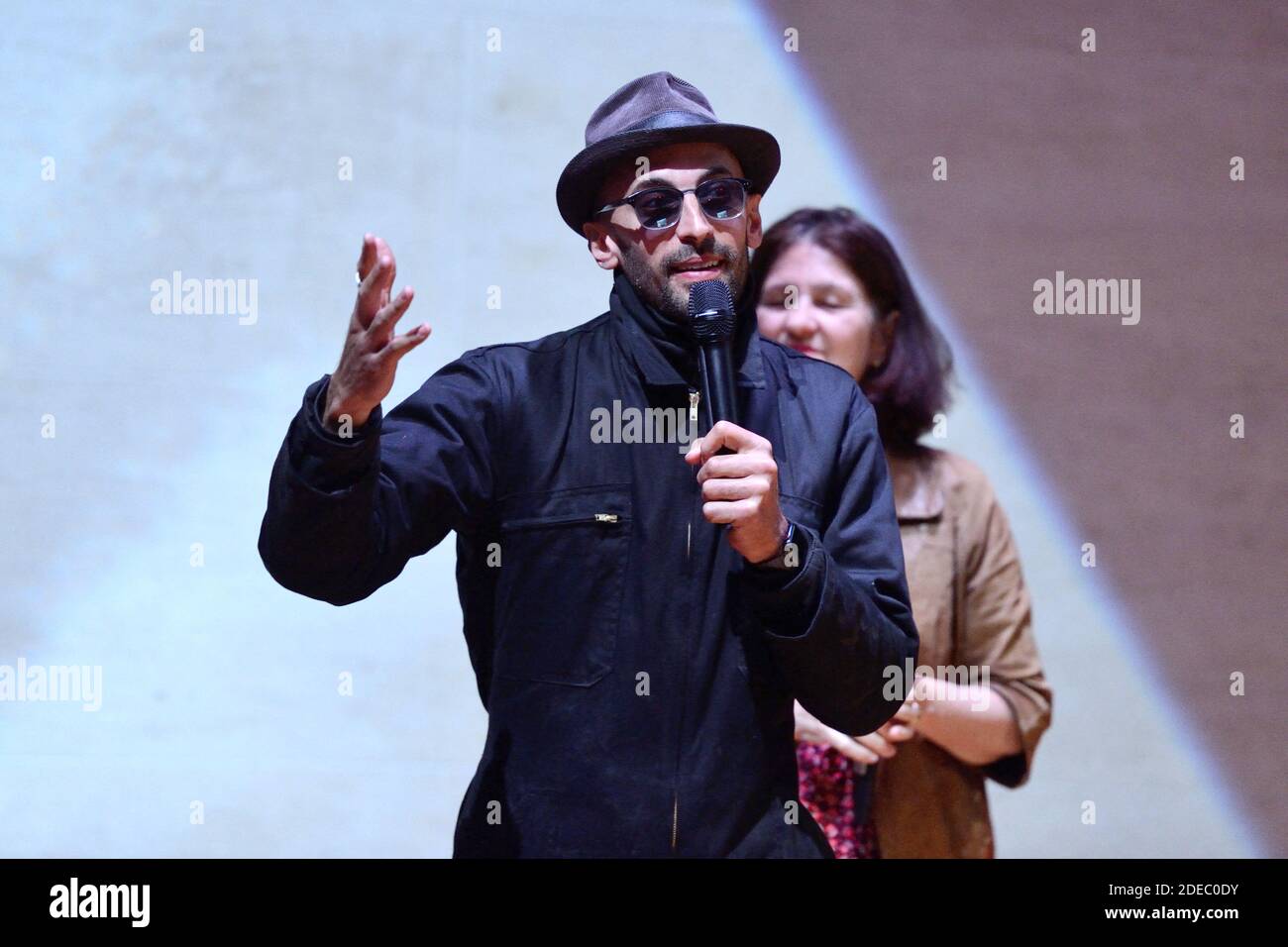 JR attending the 'JR au Louvre & Le Secret de la Grande Pyramide ...