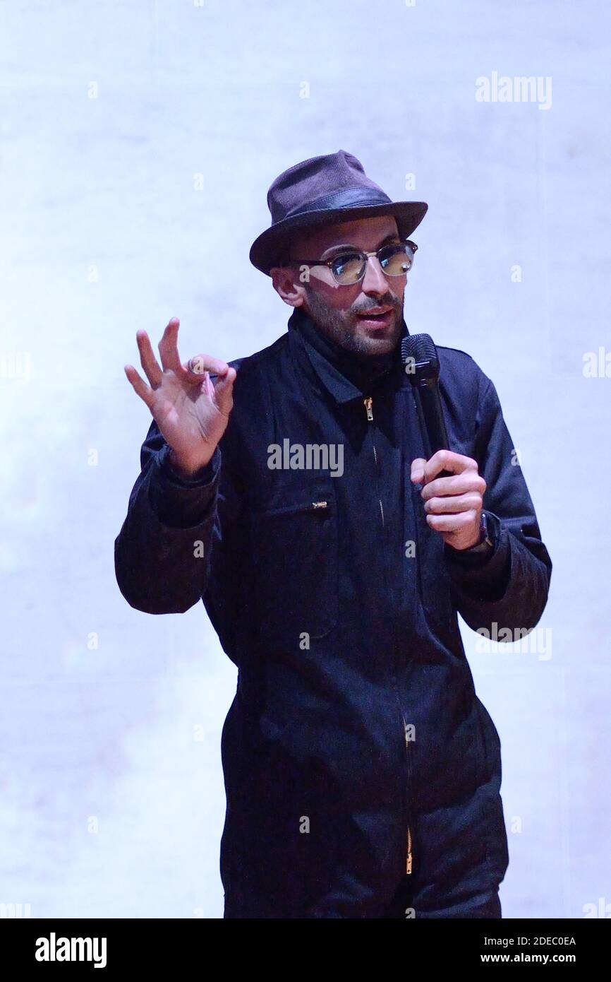 JR attending the 'JR au Louvre & Le Secret de la Grande Pyramide' : Photographer and artist Jean Rene, aka JR, creates a monumental Piece of Art on the scale of Napoleon Court of the Louvre Museum on March 29, 2019 in Paris, France. As part of the celebrations of the 30th anniversary of the Louvre Pyramid, the street artist JR proposes a giant collage to bring out the Pyramid of the Louvre by revealing the foundations of the Napoleon courtyard where it is erected. Photo by Aurore Marechal/ABACAPRESS.COM Stock Photo