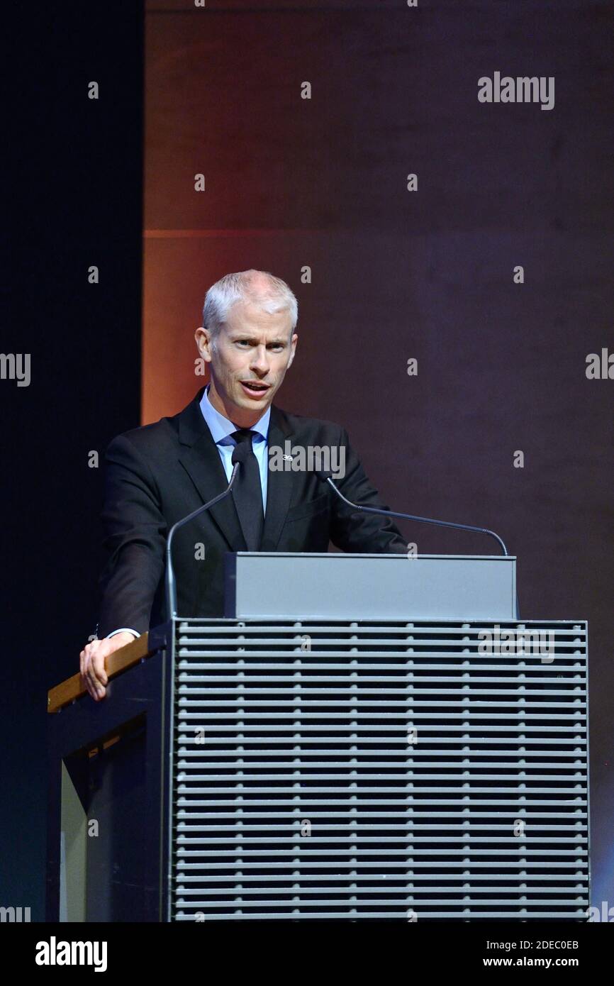 Le Ministre de la Culture Franck Riester attending the 'JR au Louvre & Le Secret de la Grande Pyramide' : Photographer and artist Jean Rene, aka JR, creates a monumental Piece of Art on the scale of Napoleon Court of the Louvre Museum on March 29, 2019 in Paris, France. As part of the celebrations of the 30th anniversary of the Louvre Pyramid, the street artist JR proposes a giant collage to bring out the Pyramid of the Louvre by revealing the foundations of the Napoleon courtyard where it is erected. Photo by Aurore Marechal/ABACAPRESS.COM Stock Photo