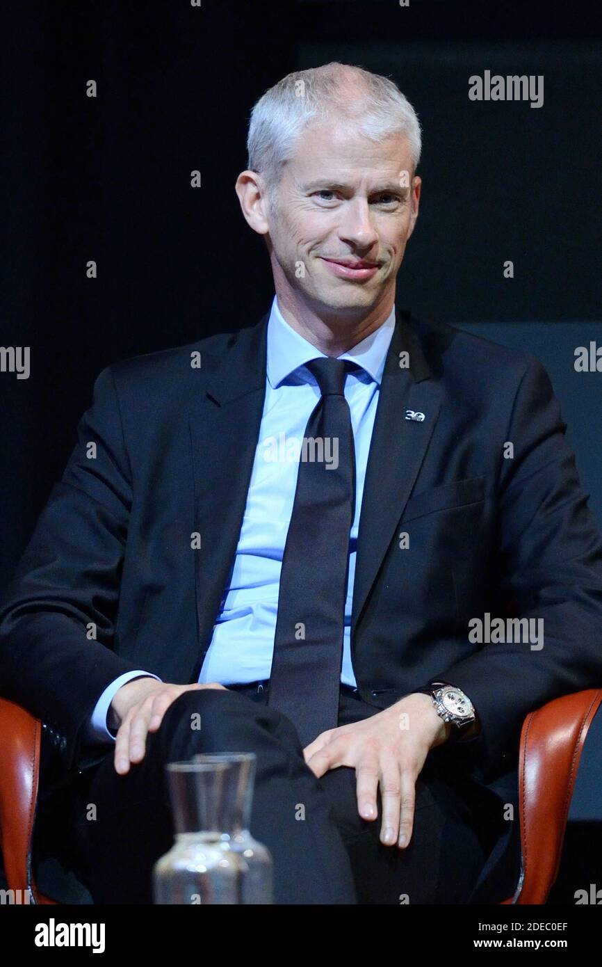 Le Ministre de la Culture Franck Riester attending the 'JR au Louvre & Le Secret de la Grande Pyramide' : Photographer and artist Jean Rene, aka JR, creates a monumental Piece of Art on the scale of Napoleon Court of the Louvre Museum on March 29, 2019 in Paris, France. As part of the celebrations of the 30th anniversary of the Louvre Pyramid, the street artist JR proposes a giant collage to bring out the Pyramid of the Louvre by revealing the foundations of the Napoleon courtyard where it is erected. Photo by Aurore Marechal/ABACAPRESS.COM Stock Photo