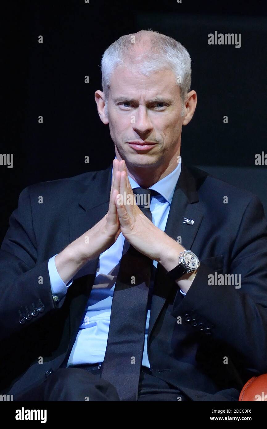 Le Ministre de la Culture Franck Riester attending the 'JR au Louvre & Le Secret de la Grande Pyramide' : Photographer and artist Jean Rene, aka JR, creates a monumental Piece of Art on the scale of Napoleon Court of the Louvre Museum on March 29, 2019 in Paris, France. As part of the celebrations of the 30th anniversary of the Louvre Pyramid, the street artist JR proposes a giant collage to bring out the Pyramid of the Louvre by revealing the foundations of the Napoleon courtyard where it is erected. Photo by Aurore Marechal/ABACAPRESS.COM Stock Photo