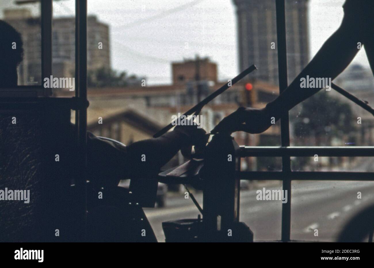 Passenger deposits her fare on a Metropolitan Atlanta Rapid Transit