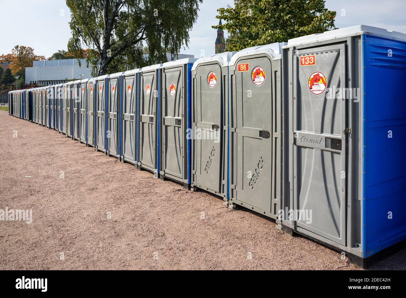 Long row of portable chemical toilets Stock Photo
